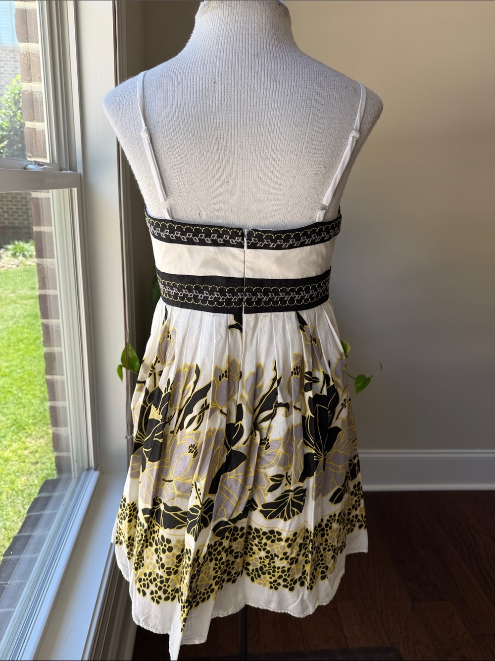 White Floral Spaghetti-Strap Mini Dress with Black Trim and Yellow Accents - Picture 2 of 3